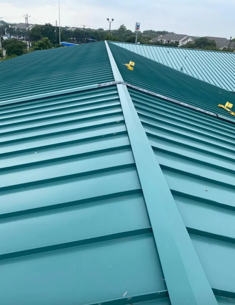 Green commercial metal roof ridge and valley for Metal Roof Repair in Coeur d'Alene