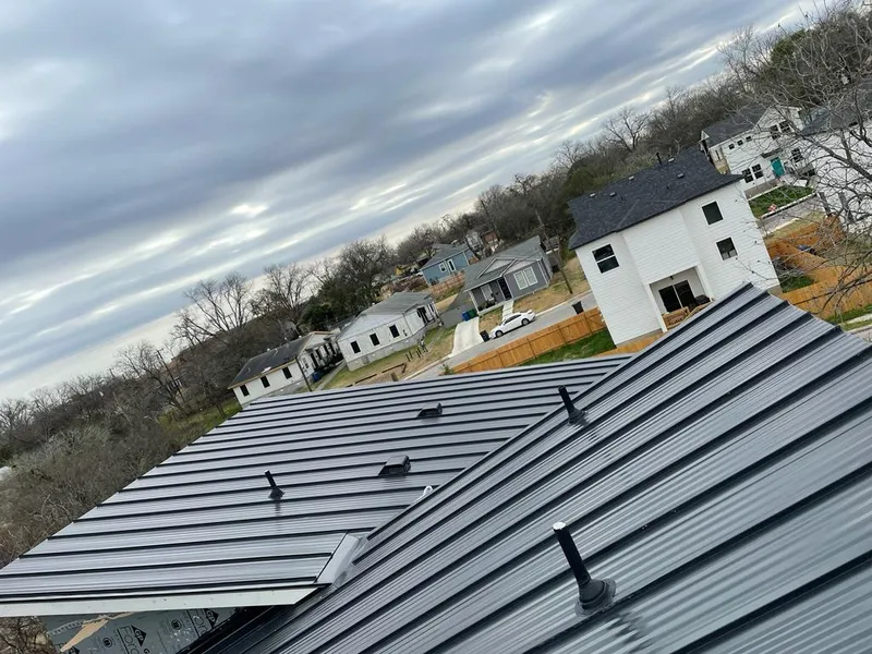 Standing seam metal roof panels with vents for Skylight Repair in Coeur d'Alene